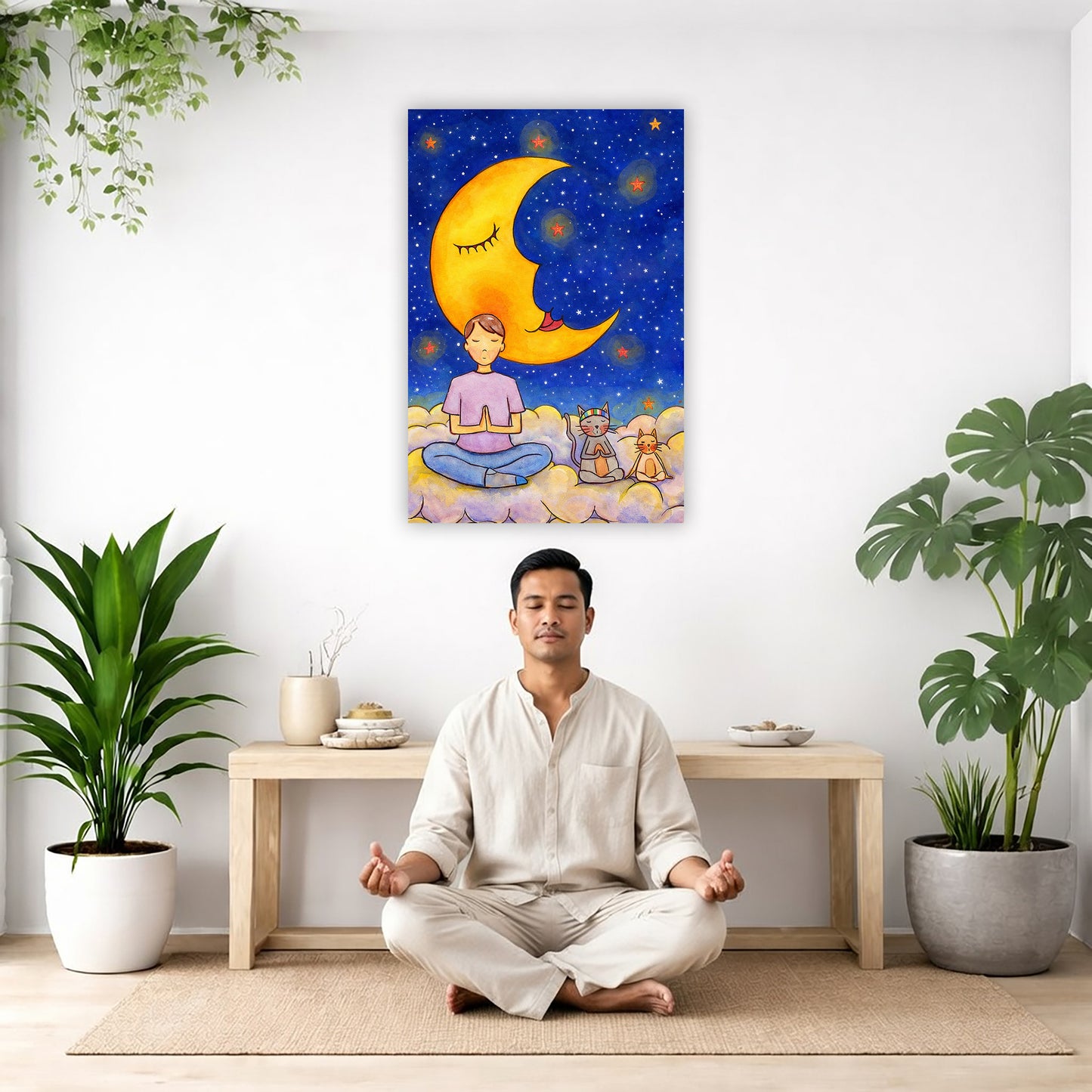 Man and his cats are meditating atop a cloud under the moon in a mindfulness poster. The canvas is in the center of the living room wall. There is a man meditating facing away from the wall. Behind him is a coffee table with incense and a Buddha statue. There are potted plants on the right and left side of the background.