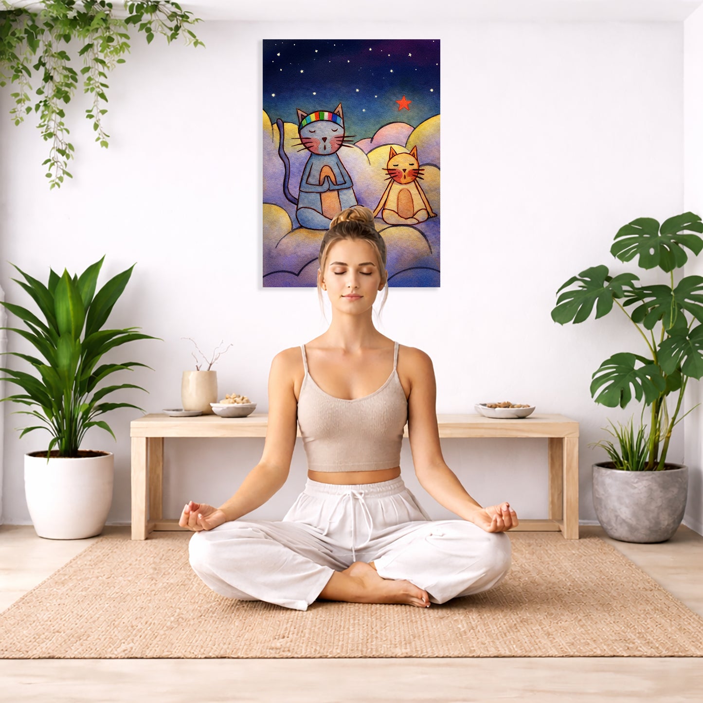 Woman meditating in a room with plants and a colorful painting of cats on the wall.