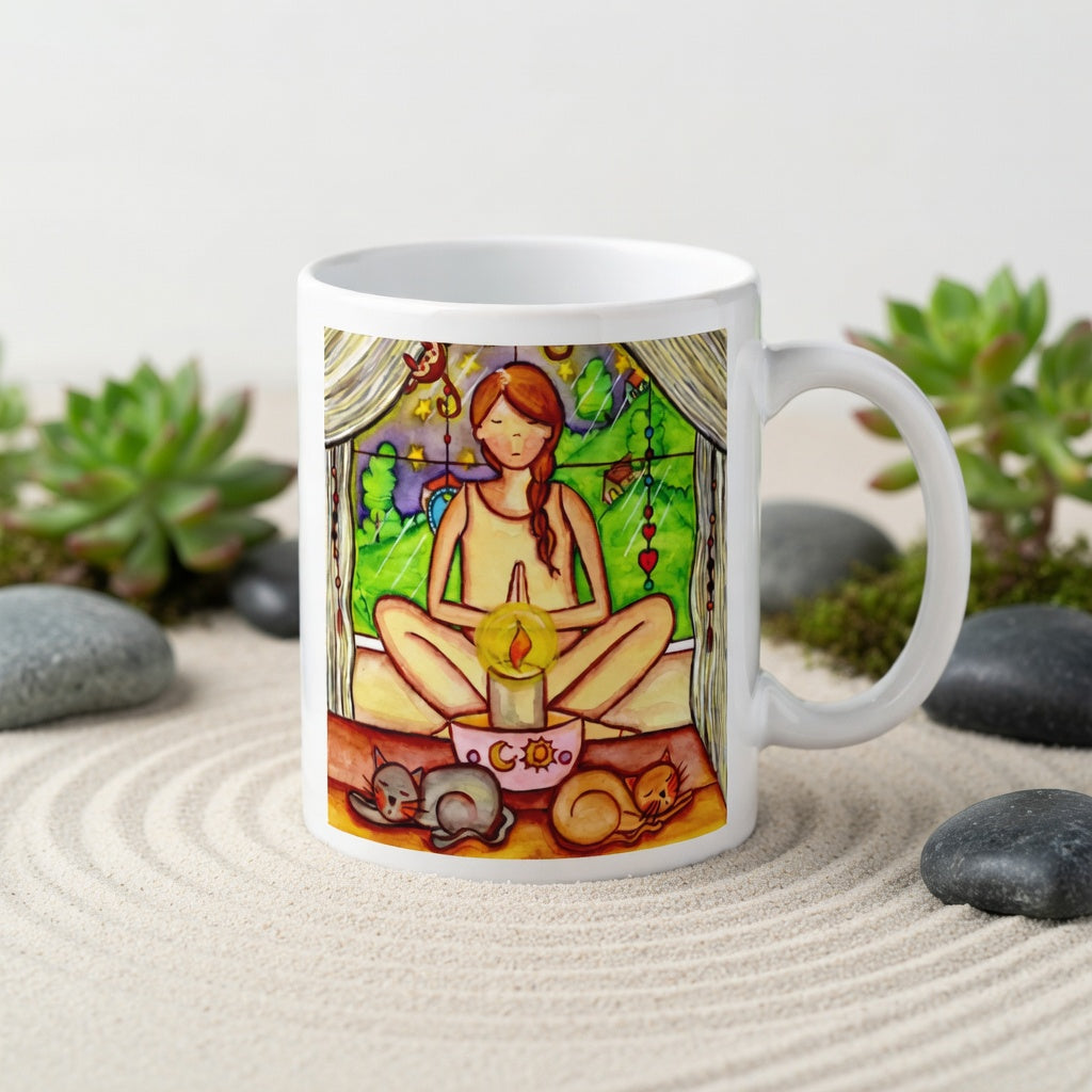 Candlelight trataka meditation design on mindfulness mug. Two cats are sleeping in front of the lady as she meditates. The mug is in a beautifully raked zen garden with bushes and plants behind it.