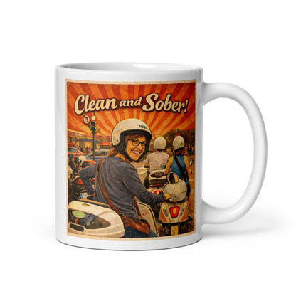 Mug with a graphic design of a person on a motorcycle and the text 'Clean and Sober!' on a white background.