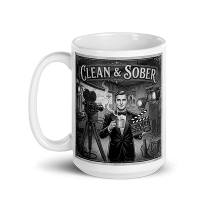 Emotional and stirring Black and white vintage illustration coffee mug featuring a tuxedo-clad man on a 1920s silent film set holding a steaming coffee mug and a clapperboard reading "Breaking Free" surrounded by period cameras and studio lights with "Clean & Sober" in marquee lettering