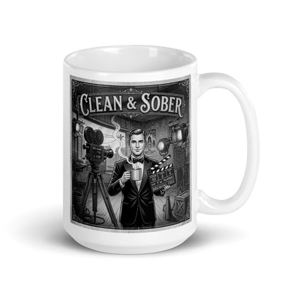 Beautiful and striking Black and white vintage illustration coffee mug featuring a tuxedo-clad man on a 1920s silent film set holding a steaming coffee mug and a clapperboard reading "Breaking Free" surrounded by period cameras and studio lights with "Clean & Sober" in marquee lettering