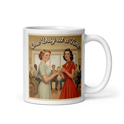 1950s retro one day at a time sobriety coffee mug design featuring women celebrating a one year recovery milestone with supportive group and vintage artwork.