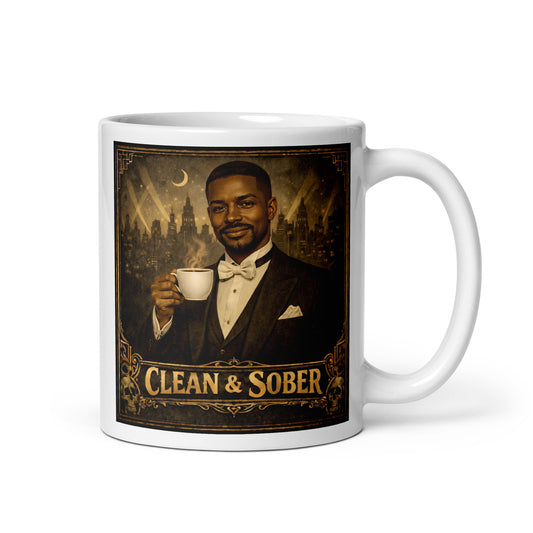 Art Deco style coffee mug featuring a well-dressed Black man in a tuxedo and bow tie holding a steaming coffee cup against a moonlit jazz-age city skyline with gold "Clean & Sober" lettering and skull corner details
