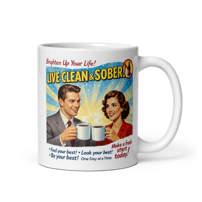 Mug with retro design featuring a man and woman holding coffee cups, text 'Live Clean & Sober!' on a white background.