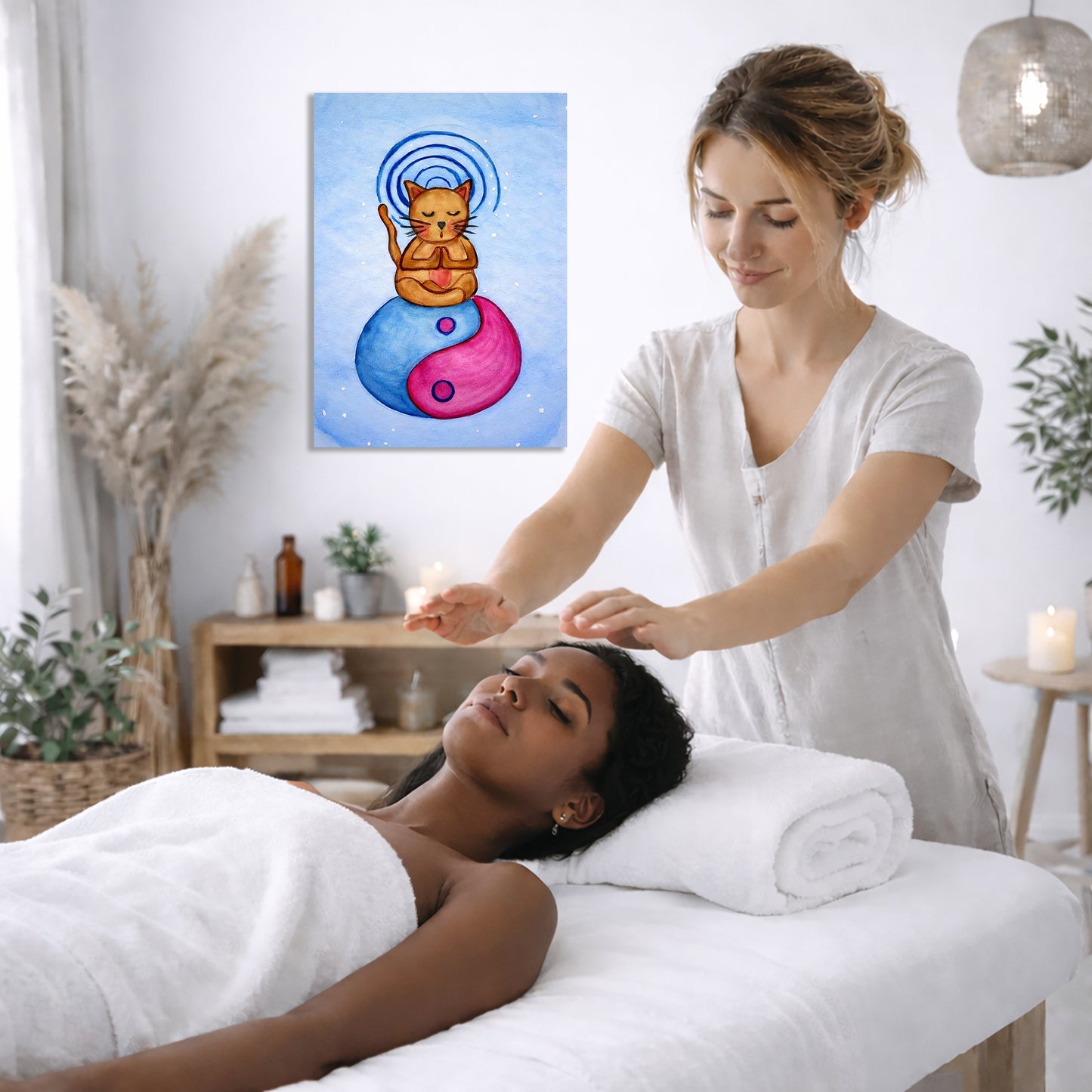 Woman receiving reiki in a spa setting with a painting on the wall.