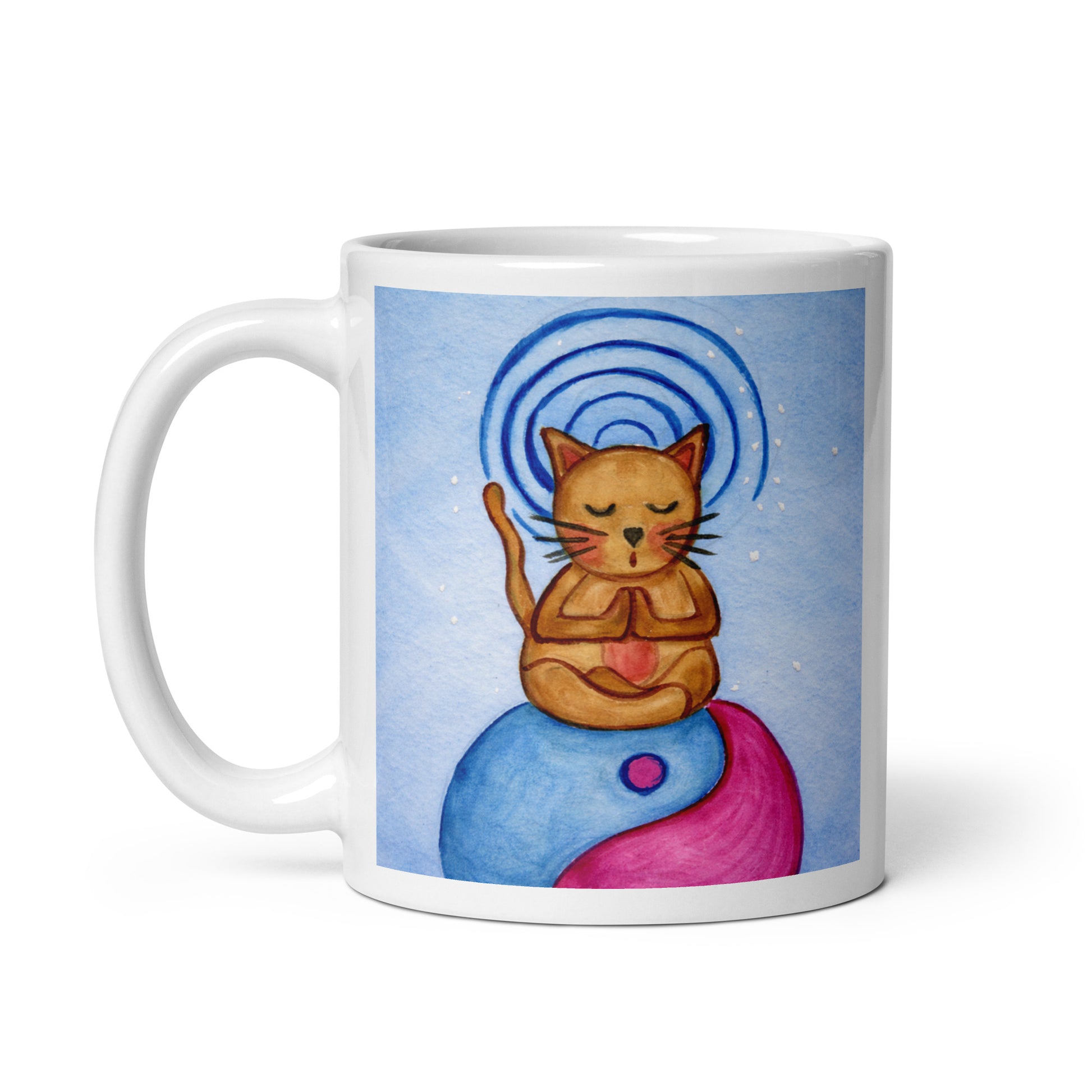 Brown cat meditating on top of a blue and magenta Tao symbol with a glowing crown chakra above its head meditation mug. This illustration of a cat meditating is on both sides of the mug. In this image the handle of the mug is on the left side.