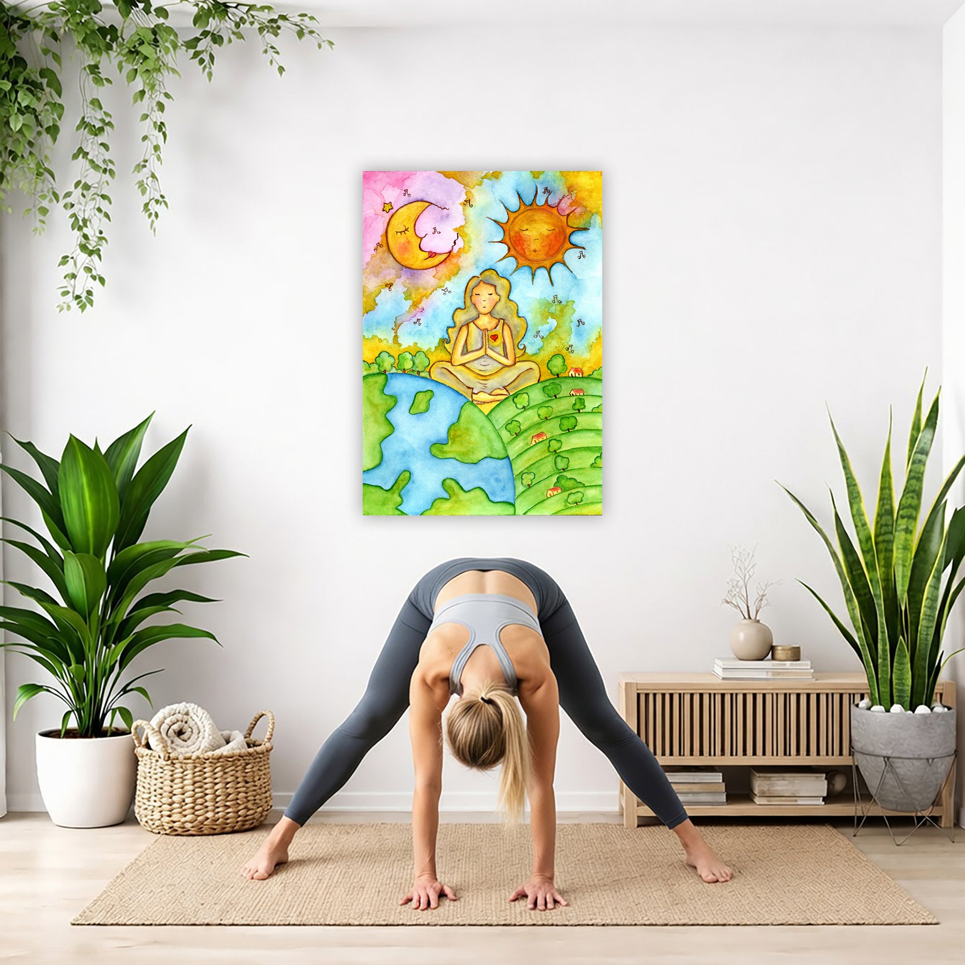 Canvas of a womans calm meditation beneath the sun and moon.  The canvas is in the center of the living room wall. A woman is doing a sun salutation on her yoga mat. 
