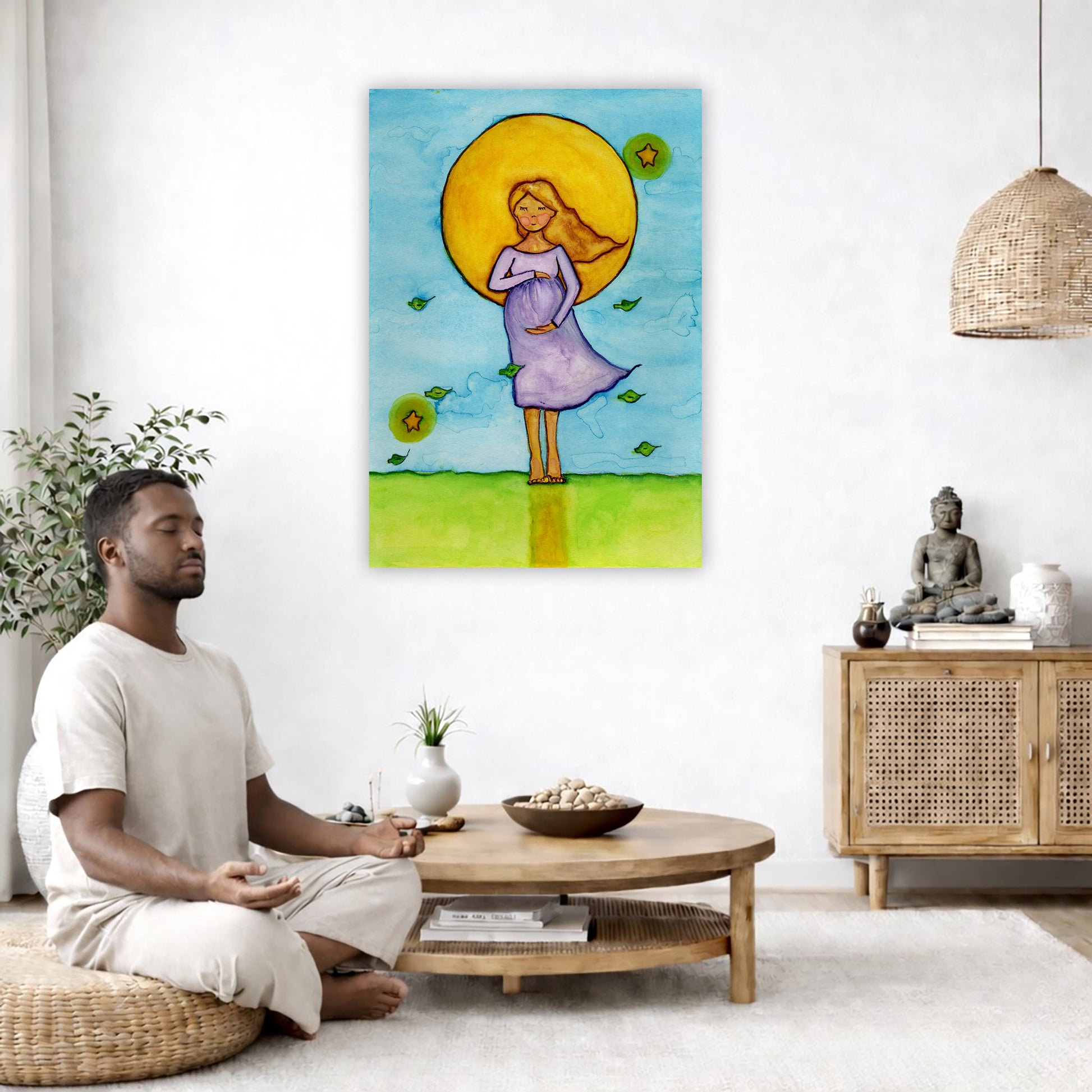 A woman standing in meditation under a bright yellow sun with a blue sky background, canvas watercolor print. The canvas is in the center of the living room wall. A man is on a chair on the left side of his living room meditating. On the right side is a cabinet with a Buddha statue on it.
