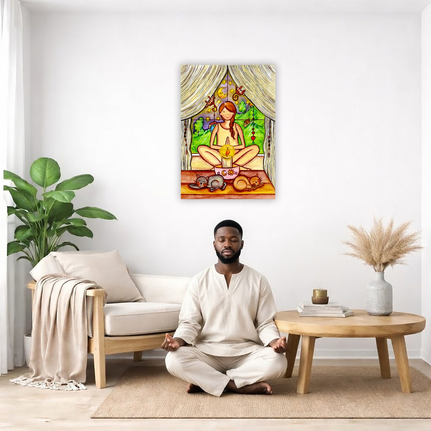 A woman candlelight trataka meditation design on mindfulness canvas.  The canvas is in the center of the living room wall. There is a man meditating facing away from the wall. Behind him is a coffee table with incense and a Buddha statue. There are potted plants on the right and left side of the background.
