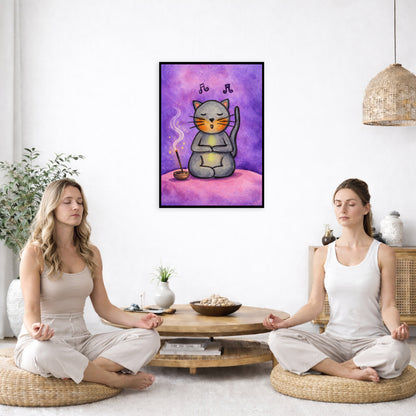 A gray cat chanting on a pink cloud framed poster. This is a print of the original hand-painted watercolor by Brazilian artist Thaís Suizo. The poster is in the center of the living room wall. Two women are sitting on a giant pillow having a coffee. Beside them is a small tray with a pot of coffee and incense. To the left is a green floor plant and a hanging green plant. To the right of them is a green floor plant.
