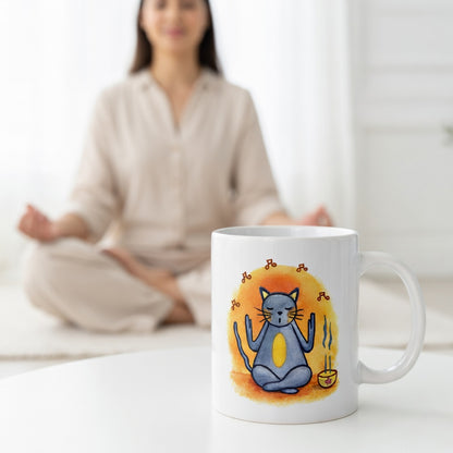 Gray cat chanting peacefully with music playing and incense smoke rising on an orange background in a calm setting coffee mug.  The mug is on the floor at the bottom center of the image. In the background a woman is meditating.