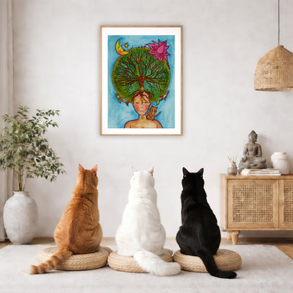 Poster of the crown chakra of a woman opening up like the tree of life. A cat is on her shoulder.  The poster framed is hanging on the wall. Three cats are staring up at the poster, orange, white and black. There is a potted plant on the left side and a cabinet with a Buddha statue, books and incense on the right side.
