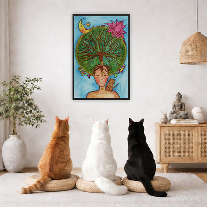 Framed poster of the crown chakra of a woman opening up like the tree of life. A cat is on her shoulder. The poster framed is hanging on the wall. Three cats are staring up at the poster, orange, white and black. There is a potted plant on the left side and a cabinet with a Buddha statue, books and incense on the right side.
