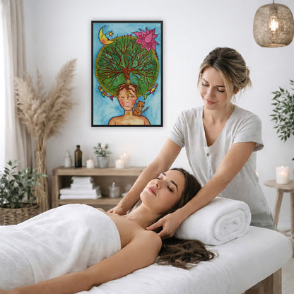 Framed poster of the crown chakra of a woman opening up like the tree of life. A cat is on her shoulder.  The poster is on the wall of the office of a massage therapist. The therapist is giving her female client a massage. The client is lying face up on a massage table wearing a white towel. To the left is a window, floor plant and large vase of dry flora. A shelf is underneath the poster with candles burning. There is a candle burning on a small table and a hanging lamp with a wicker shade on the right sid