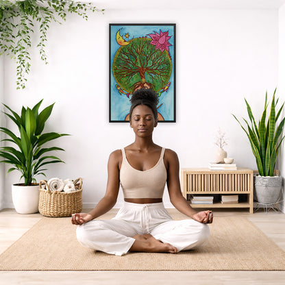 Framed poster of the crown chakra of a woman opening up like the tree of life. A cat is on her shoulder. The poster is in the center of the living room wall. There is a woman meditating facing away from the wall. Behind her is a coffee table with incense and a Buddha statue. There are potted plants on the right and left side of the background.
