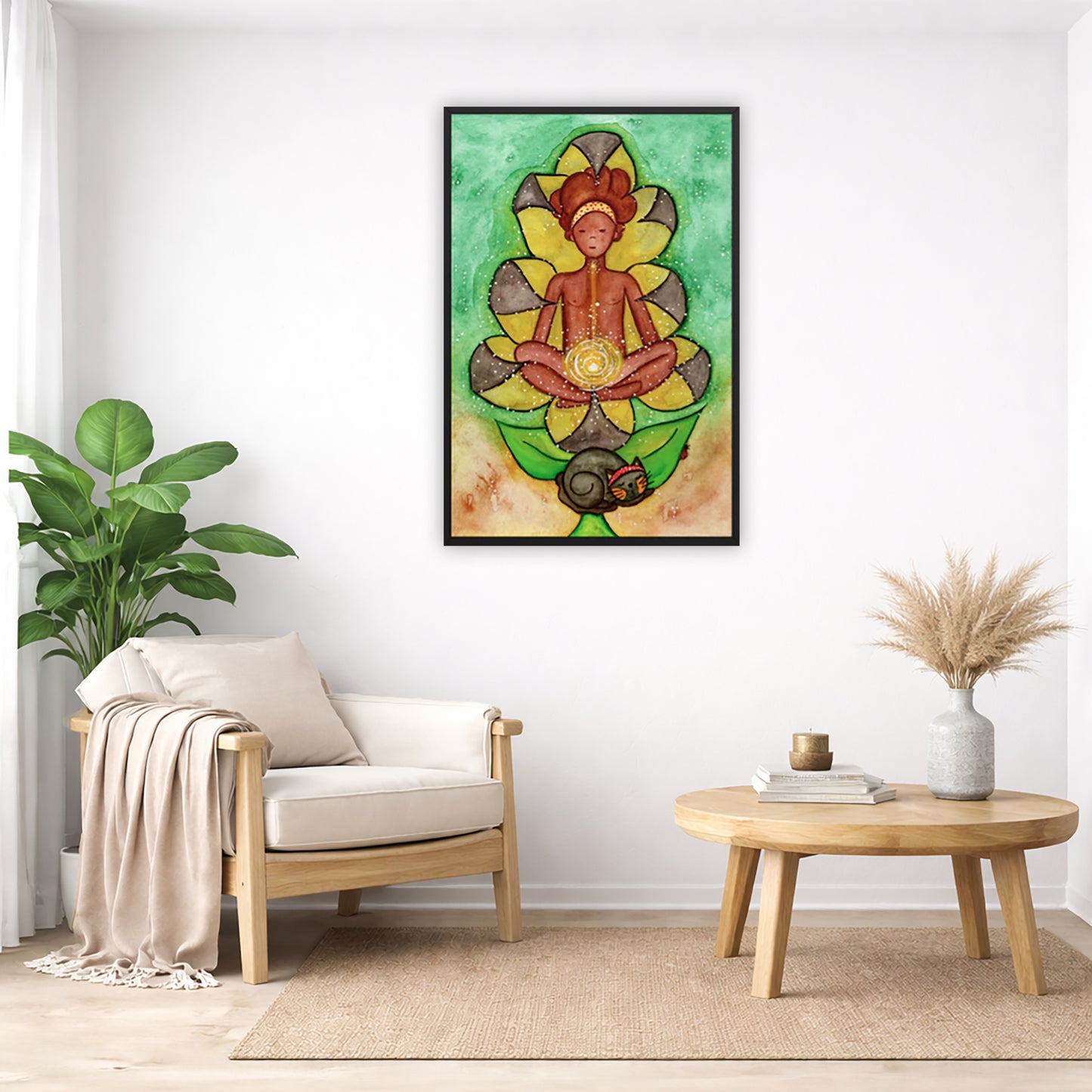 Poster of a woman's sacral chakra glowing and the energy around her.  The poster is in the center of the living room wall. Below the poster to the left is a living room chair, a floor plant and white curtains. To the right is a small table with books, a candle and a vase with dry flora.
