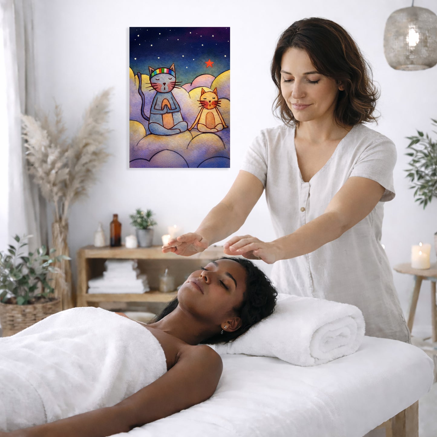Woman receiving reiki in a spa setting with a painting of cats in the corner.