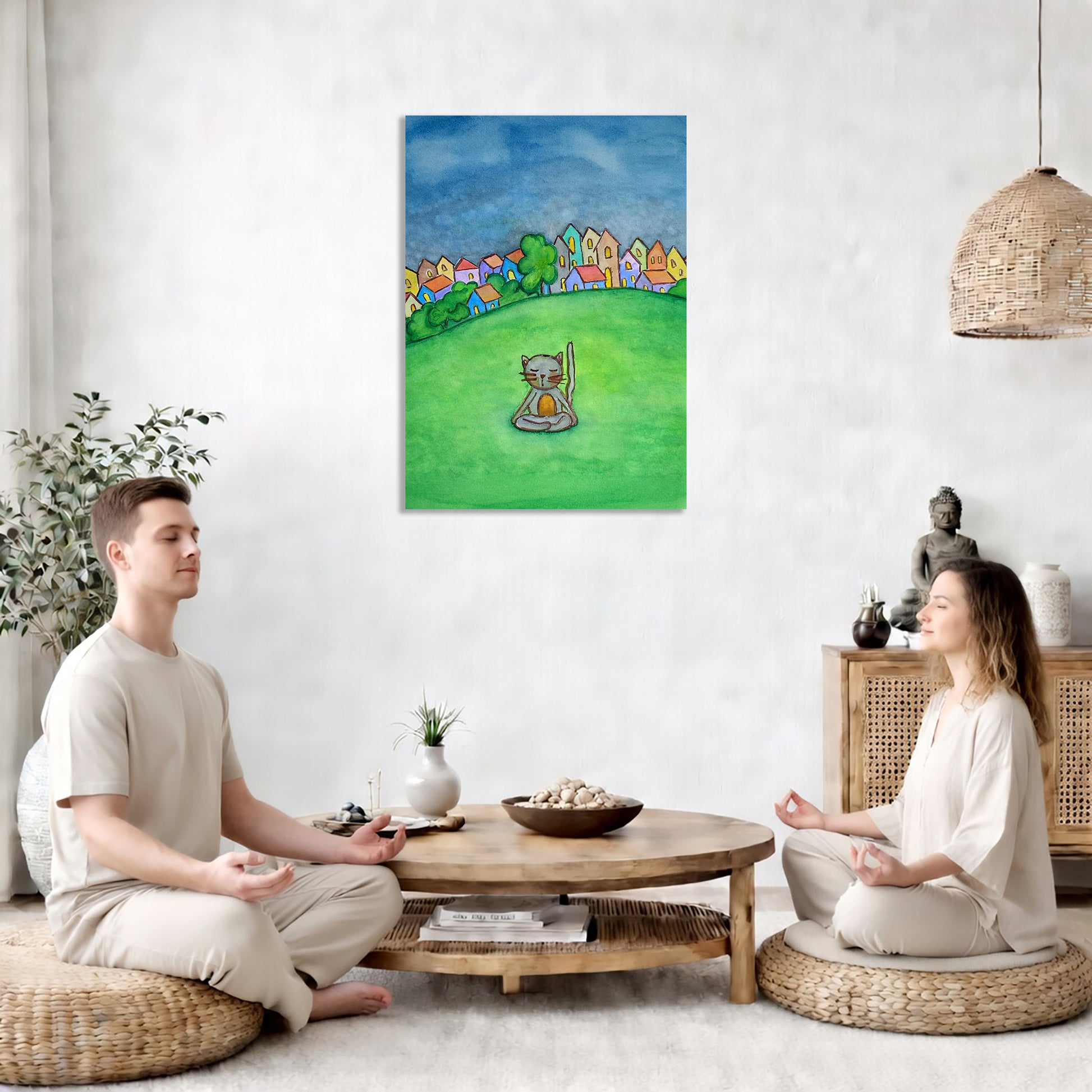 Two people meditating in a room with a colorful painting of a cat on a green field.
