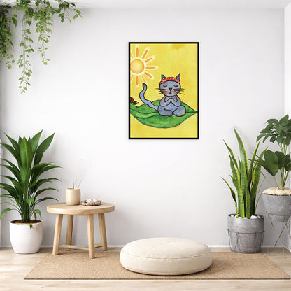 Gray cat meditating on a leaf under a sunny sky framed poster. This is a print of the original hand-painted watercolor by Brazilian artist Thaís Suizo.  The poster is in the center of the living room wall. Below the poster is a pillow on a wicker mat. To the bottom left there is a small table with incense and a bowl of shells. There is also a hanging and potted plant. To the right are two potted green plants.
