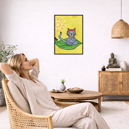 Gray cat meditating on a leaf under a sunny sky framed poster. This is a print of the original hand-painted watercolor by Brazilian artist Thaís Suizo.  The poster is in the center of the living room wall. To the left a woman is relaxing in her chair with her hands behind her head. There is a small coffee table beside her with a bowl of walnuts, incense and a small green plant. On the right side of the room is a cabinet with a Buddha statue, books and an urn on it. To the left is a green floor plant.