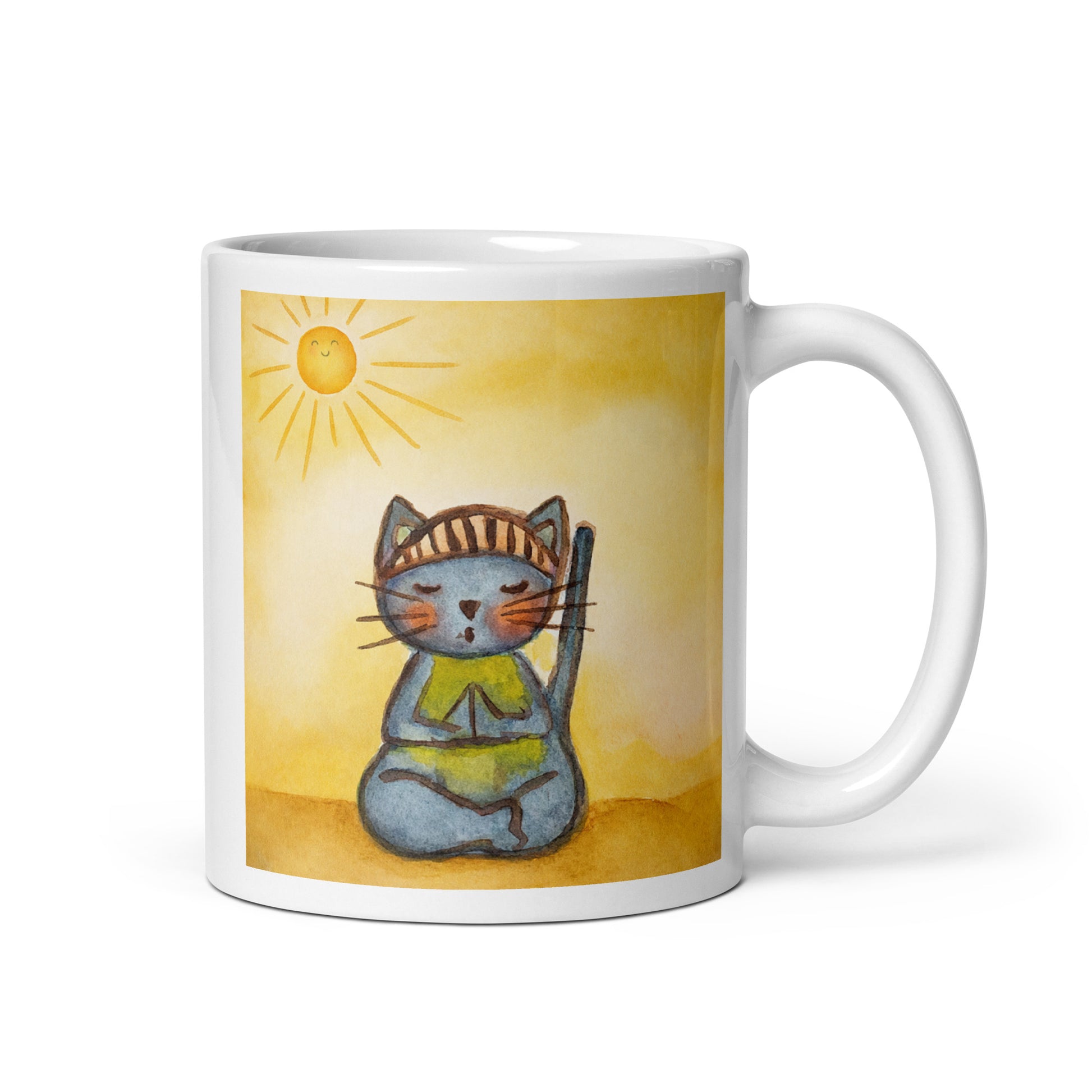 Gray cat meditating on a sunny day mindfulness mug. This illustration of a cat meditating is on both sides of the mug. In this image the handle of the mug is on the right side.