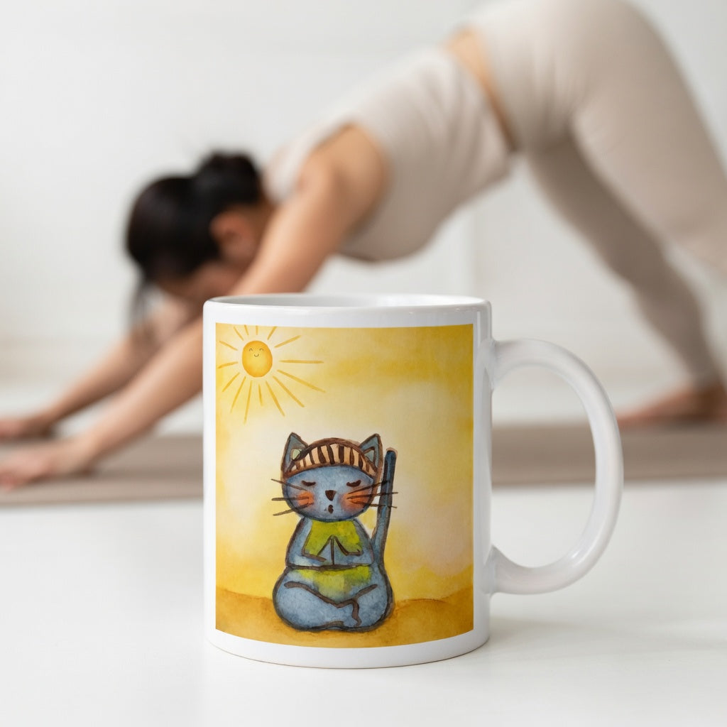 Gray cat meditating on a sunny day mindfulness mug.  Incense is burning beside the mug.  The mug is in front of a woman doing the yoga posture downward facing dog.