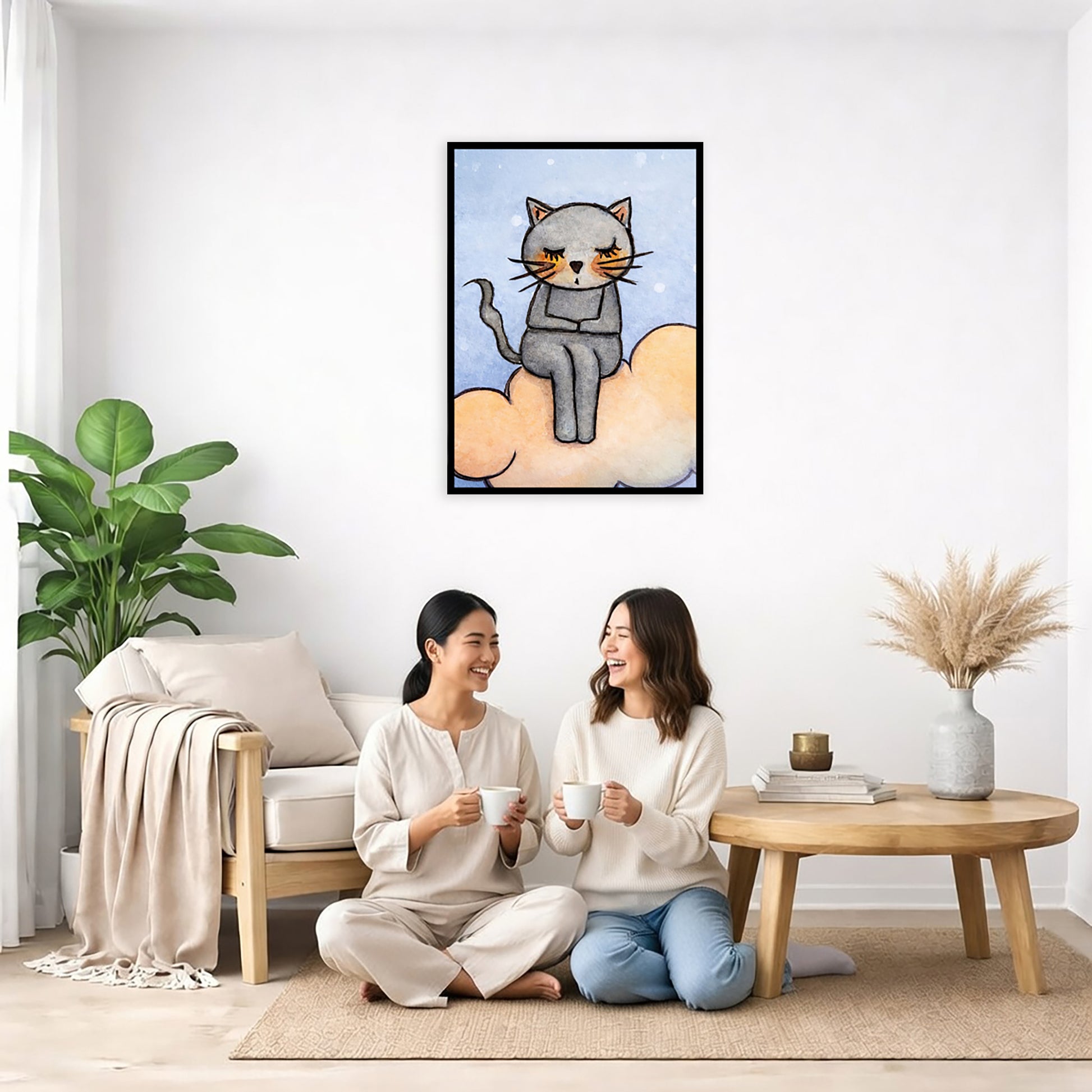 A gray cat meditating on an orange cloud framed poster. This is a print of the original hand-painted watercolor by Brazilian artist Thaís Suizo.  The poster is in the center of the living room wall. Two friends are sitting on the living room carpet having a coffee. Beside them is a small tray with a pot of coffee, cookies and a candle burning. To the left is a green floor plant and a hanging green plant. To the right of them is a green floor plant.