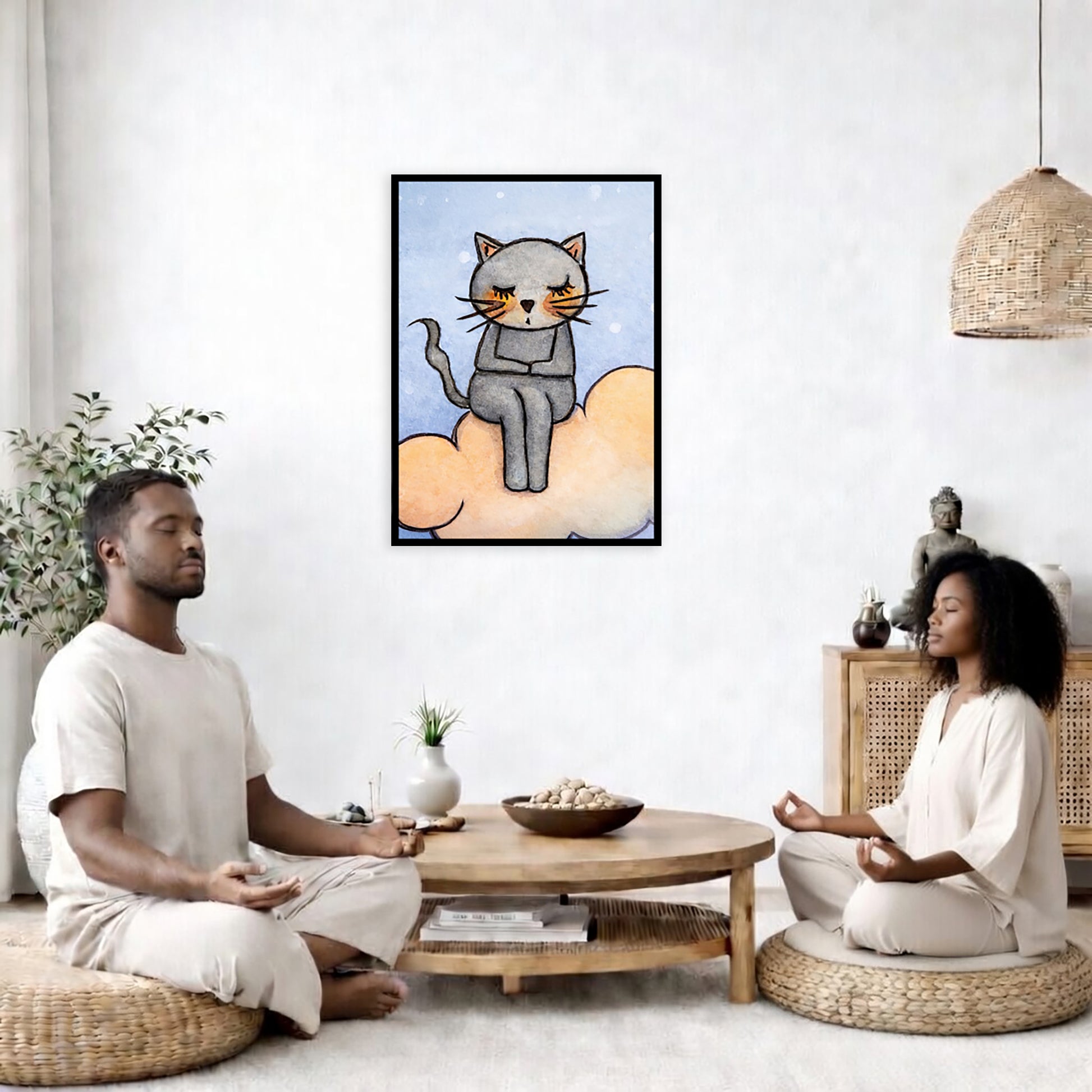 A gray cat meditating on an orange cloud framed poster. This is a print of the original hand-painted watercolor by Brazilian artist Thaís Suizo. The poster is in the center of the living room wall. Two friends are sitting on wicker pillows meditating. Between them is a small round coffee table with incense, a green potted plant and a bowl of shells. There is a potted plant to the left and a Buddha statue and a vase to the right. 