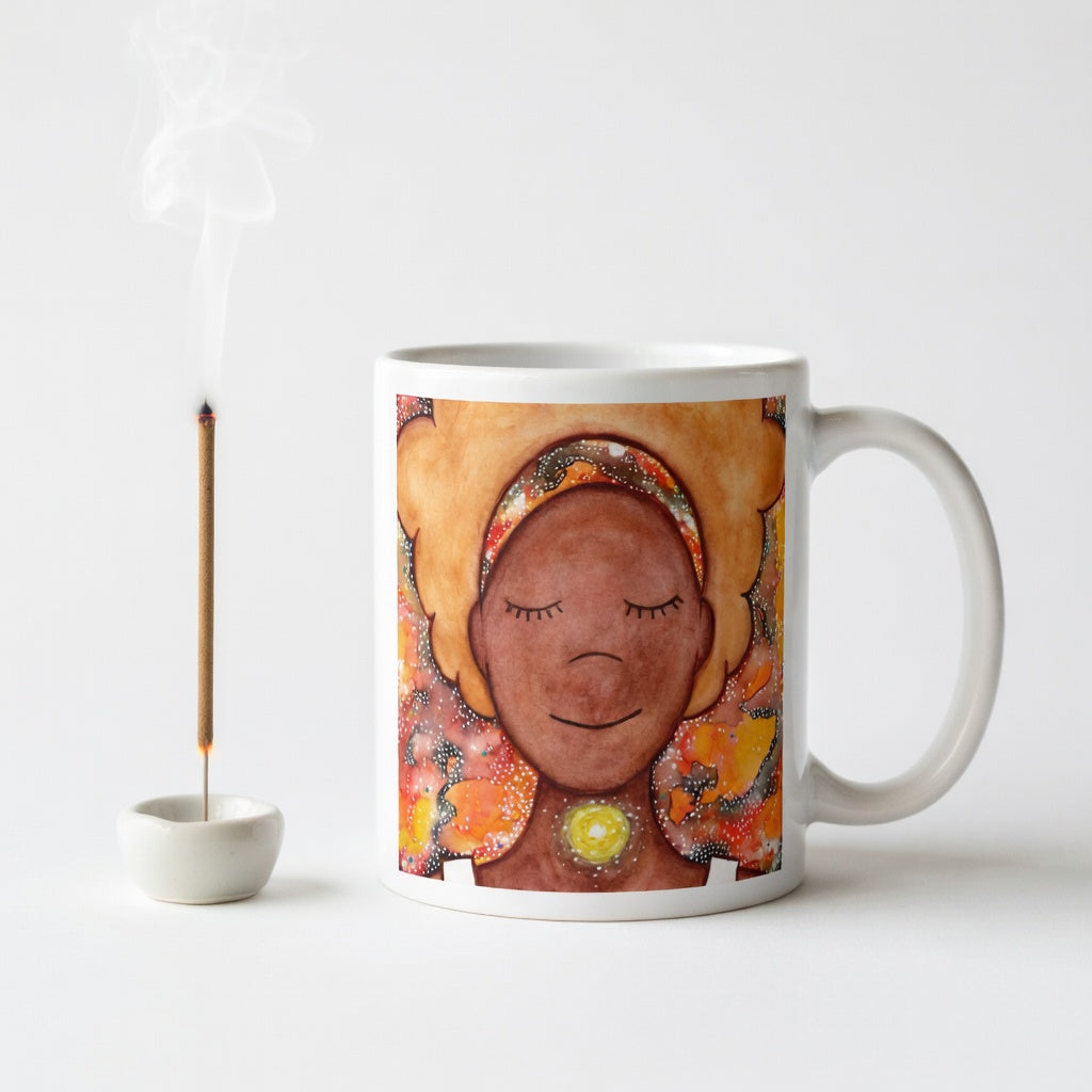 Meditating figure with glowing throat chakra, symbolizing communication, truth and self-expression, spiritual mindfulness artwork on a coffee mug.  Incense is burning beside the mug. 