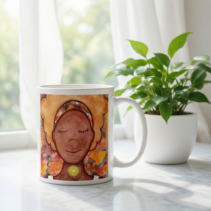 Meditating figure with glowing throat chakra, symbolizing communication, truth and self-expression, spiritual mindfulness artwork on a coffee mug.  There is a window, curtains and a green potted plant behind the mug.