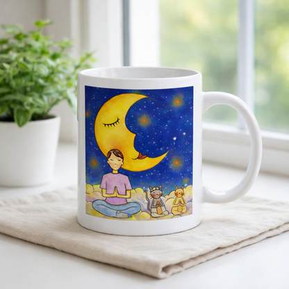 Man and his cats are meditating atop a cloud under the moon in a mindfulness poster.  The mug is sitting on a white cloth. There is a window, curtains and a green potted plant behind the mug.