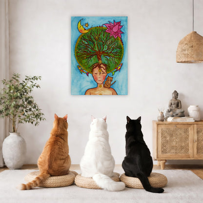 canvas of a woman meditating with her crown chakra blooming into the tree of life. Her cat is sitting on her shoulder.  The poster framed is hanging on the wall. Three cats are staring up at the poster, orange, white and black. There is a potted plant on the left side and a cabinet with a Buddha statue, books and incense on the right side.
