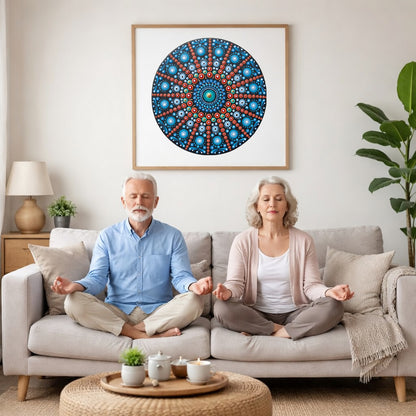 Mandala with repeating red line patterns forming symmetrical geometry, dynamic meditation design printed on a poster.  An elderly couple is meditating on their couch. The mandala is framed on a wall behind them. There is a coffee table in front with candles burning and a potted plant. There is a potted plant to the right and shelves on the left. 
