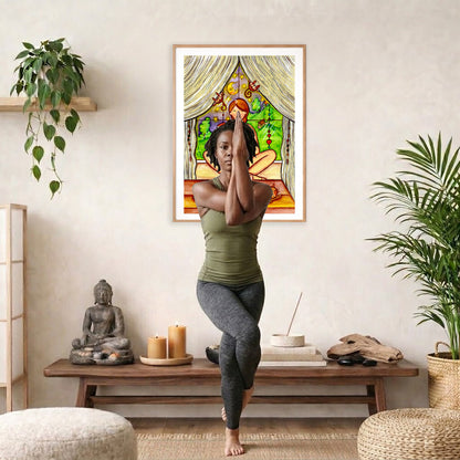 Candlelight trataka meditation design on mindfulness poster. The poster is framed and is in the center of the living room wall. A woman is doing a sitting forward bend on her yoga mat. There is a coffee table below the poster with burning candles, incense, a Buddha statue and a big piece of driftwood.
