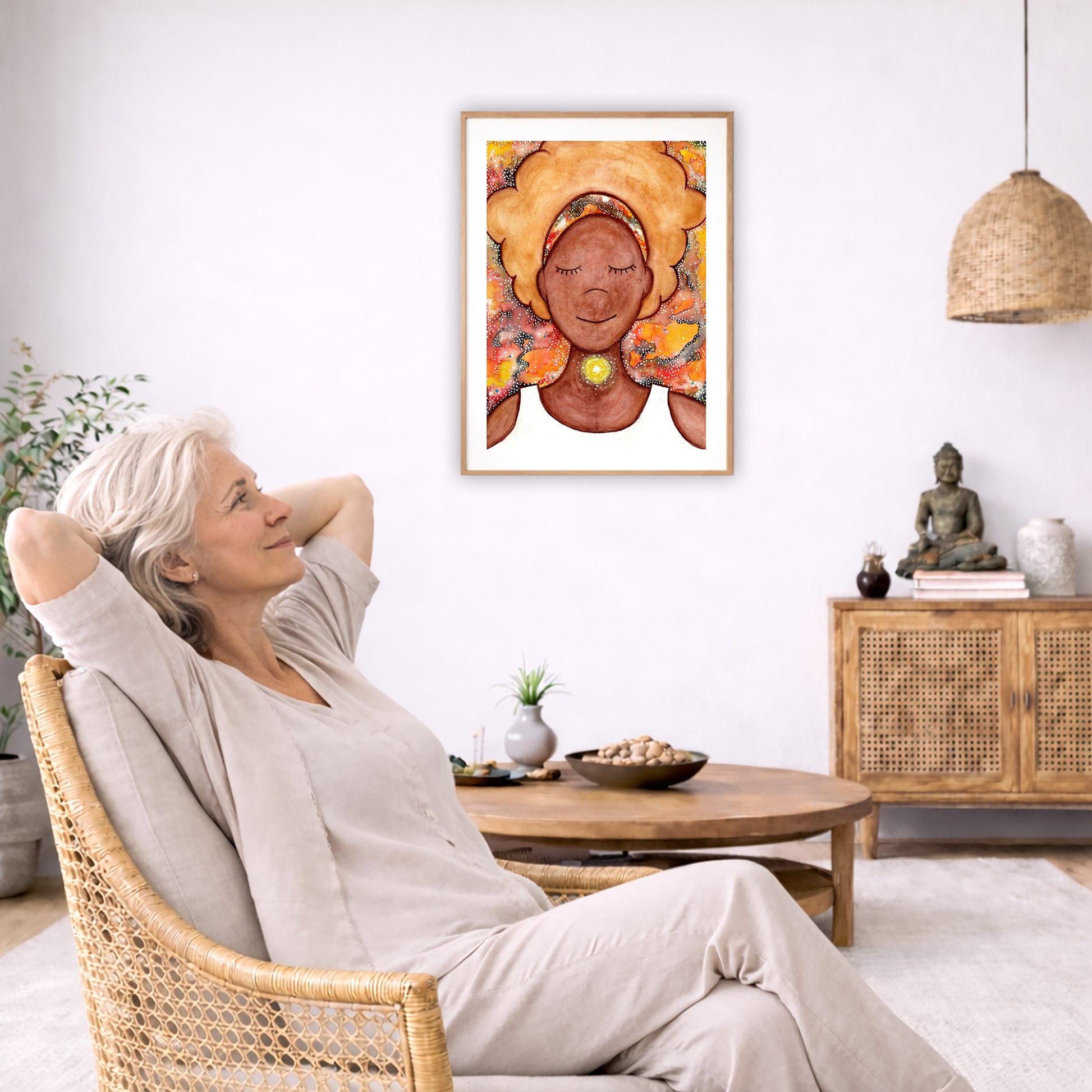 Poster of a woman's throat chakra energy glowing.  The poster is in the center of the living room wall. To the left a woman is relaxing in her chair with her hands behind her head. There is a small coffee table beside her with a bowl of walnuts, incense and a small green plant. On the right side of the room is a cabinet with a Buddha statue, books and an urn on it. To the left is a green floor plant.
