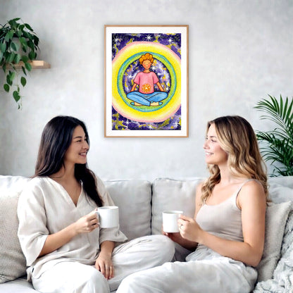 Poster of a young man meditating with his solar plexus glowing. Surrounding him is his colorful aura.  The poster is in the center of the living room wall. Two female friends are sitting on a white couch having tea. On the left and rights sides there is a green potted plant.
