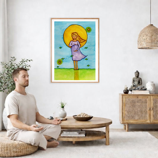 Woman standing in meditation under a glowing sun with blue sky background, calming watercolor spiritual illustration. The poster is framed and is in the center of the living room wall. A man is on a chair on the left side of his living room meditating. On the right side is a cabinet with a Buddha statue on it.
