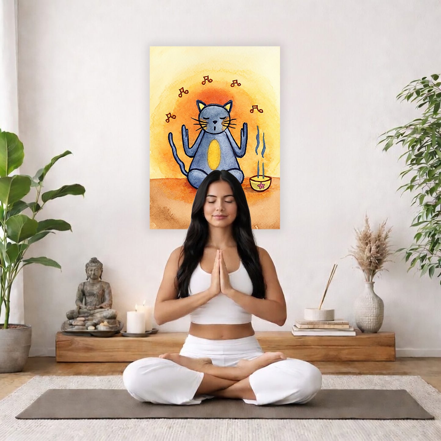 Poster of a gray cat chanting in meditation with incense smoke rising beside it. The poster is in the center of the living room wall. A woman is meditating facing toward the front with praying hands. There is a potted green plant to her right and a potted green plant and Buddha statue to her left.
