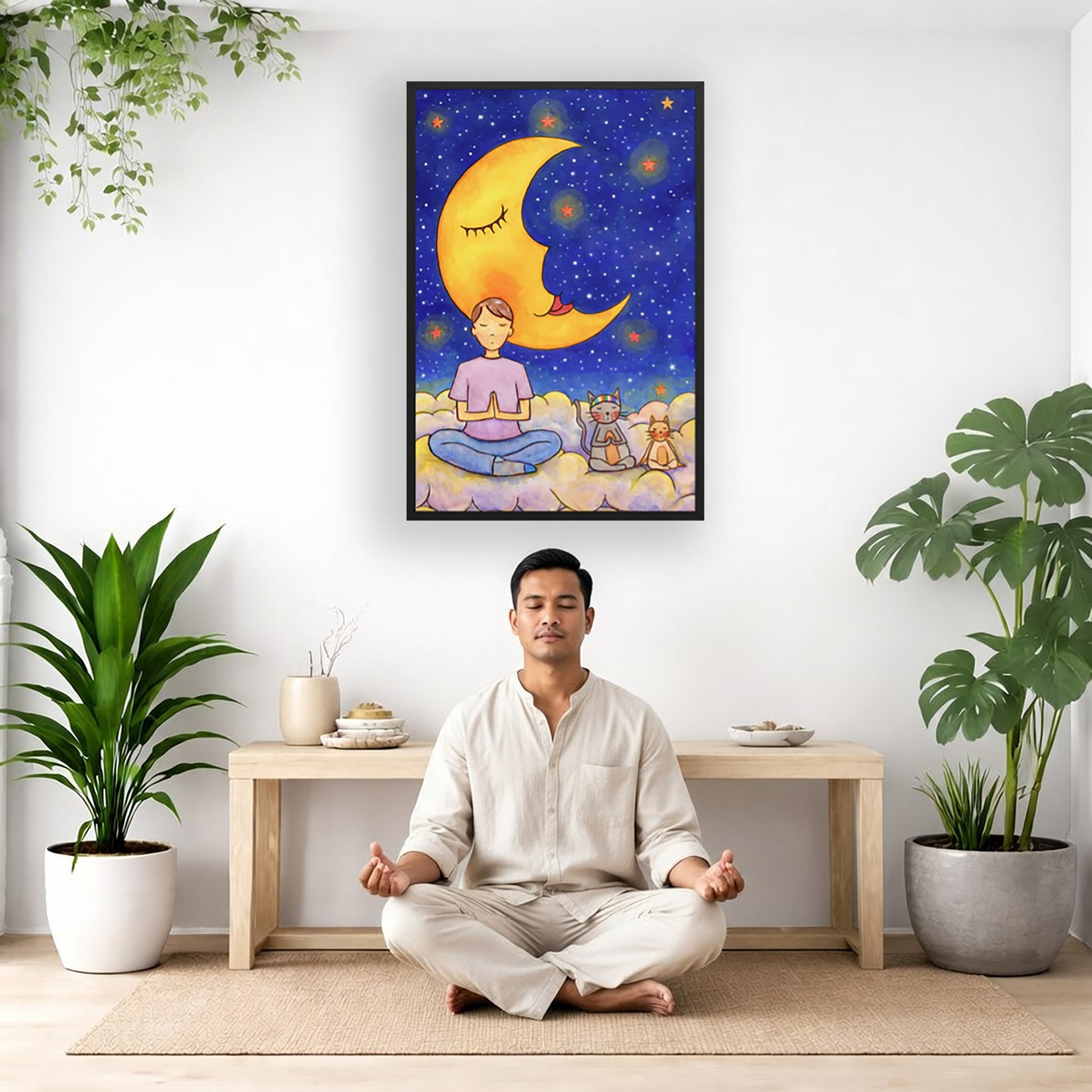 A man and his cats meditate together sitting on a cloud under the moon and the night sky. The poster is framed and is in the center of the living room wall. There is a man meditating facing away from the wall. Behind him is a coffee table with incense and a Buddha statue. There are potted plants on the right and left side of the background.
