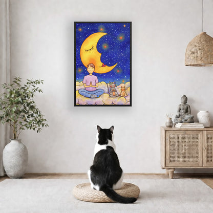 A man and his cats meditate together sitting on a cloud under the moon and the night sky. The poster is framed and is in the center of the living room wall. A black and white cat is staring at the poster. There is a potted plant on the left side and a cabinet with a Buddha statue on it on the right side. 
