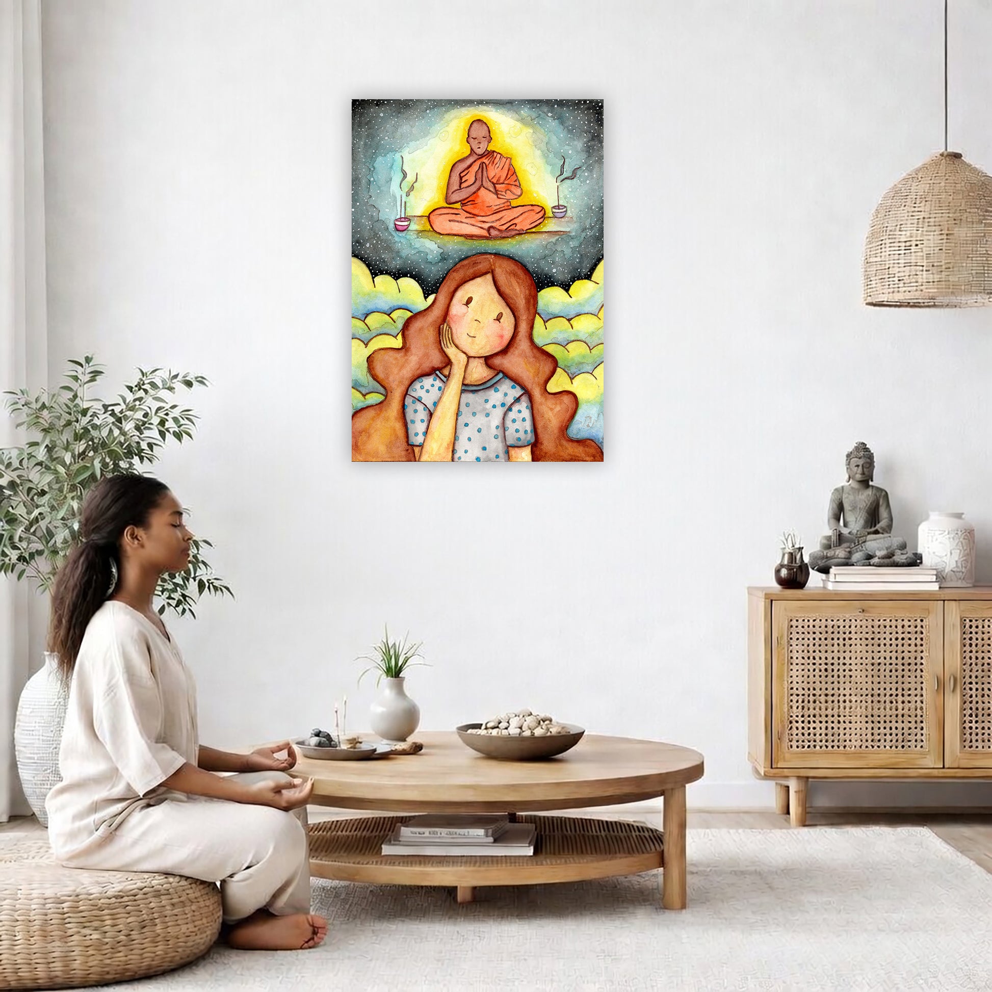 Poster of woman imagining the higher power that will guide her as she learns to meditate.  The poster is framed and is in the center of the living room wall. A woman is on a chair on the left side of his living room meditating. There is a green potted plant behind her. On the right side is a cabinet with a Buddha statue on it.
