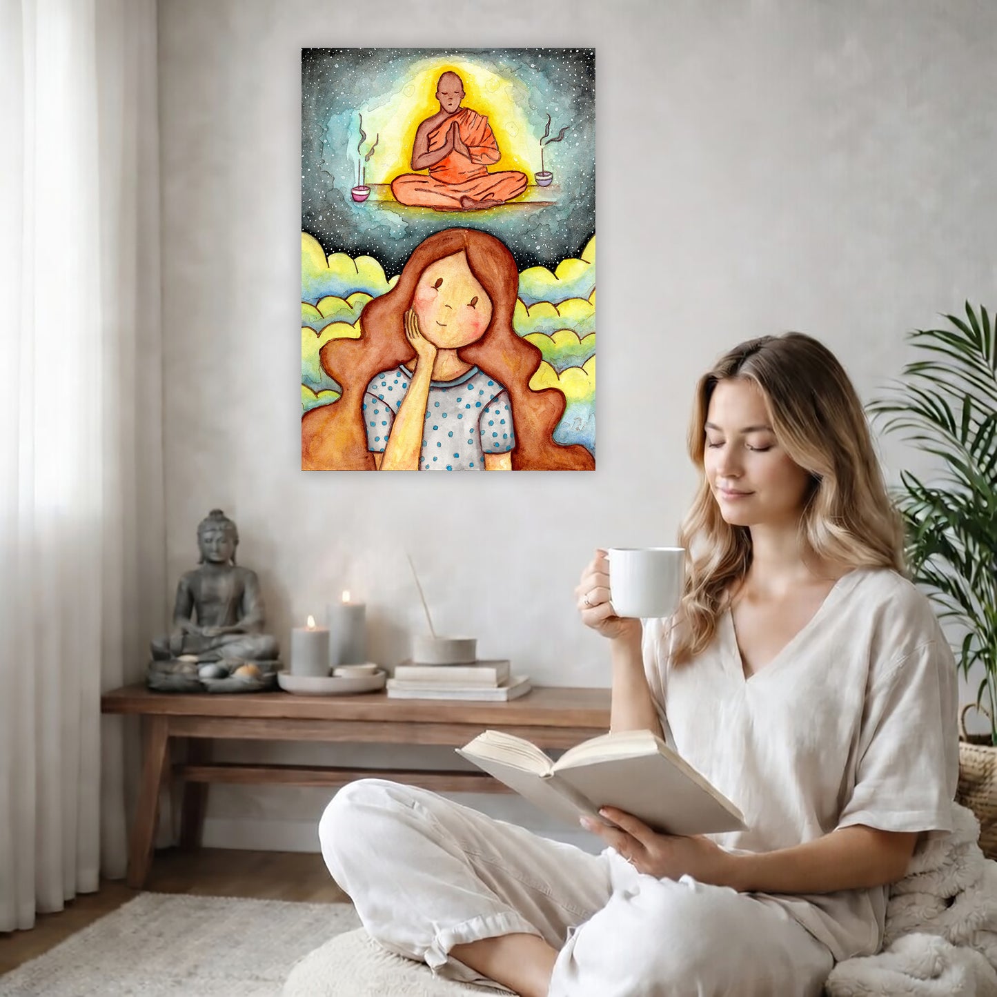 Poster of woman imagining the higher power that will guide her as she learns to meditate.  The poster is on the back wall in the living room. There is a coffee table below the poster with burning candles and a big piece of driftwood. A woman is sitting in a wicker chair on the right side of the poster with a cup of tea reading a book. There is a potted green plant behind her.