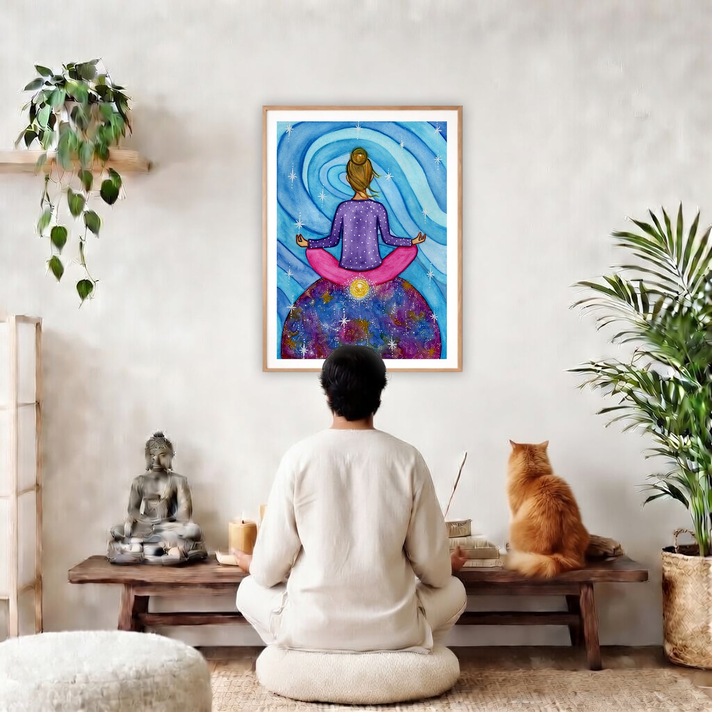 Poster of a woman meditating with her root chakra glowing.  The poster is in the center of the living room wall. A man is meditating facing the poster. In front of him is a coffee table with a Buddha statue and burning candle on the left and incense and an orange cat staring at the poster on the right. There is a green potted plant on both the left and right side of the coffee table.