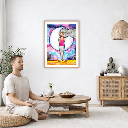 Poster of a woman's heart chakra glowing with love energy.  The poster is in the center of the living room wall. A man is on a chair on the left side of his living room meditating. On the right side is a cabinet with a Buddha statue on it.
