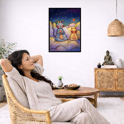 Two cats meditating on a cloud at night under the stars framed poster. This is a print of the original illustration by Brazilian artist Thaís Suizo. The poster is in the center of the living room wall. To the left a woman is relaxing in her chair with her hands behind her head. There is a small coffee table beside her with a bowl of walnuts, incense and a small green plant. On the right side of the room is a cabinet with a Buddha statue, books and an urn on it. To the left is a green floor plant.