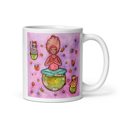 Woman and multiple cats meditating while sitting on the world, symbolizing unity, peace and global mindfulness, unique spiritual mug design. This illustration is on both sides of the mug. In this image the handle of the mug is on the right side.