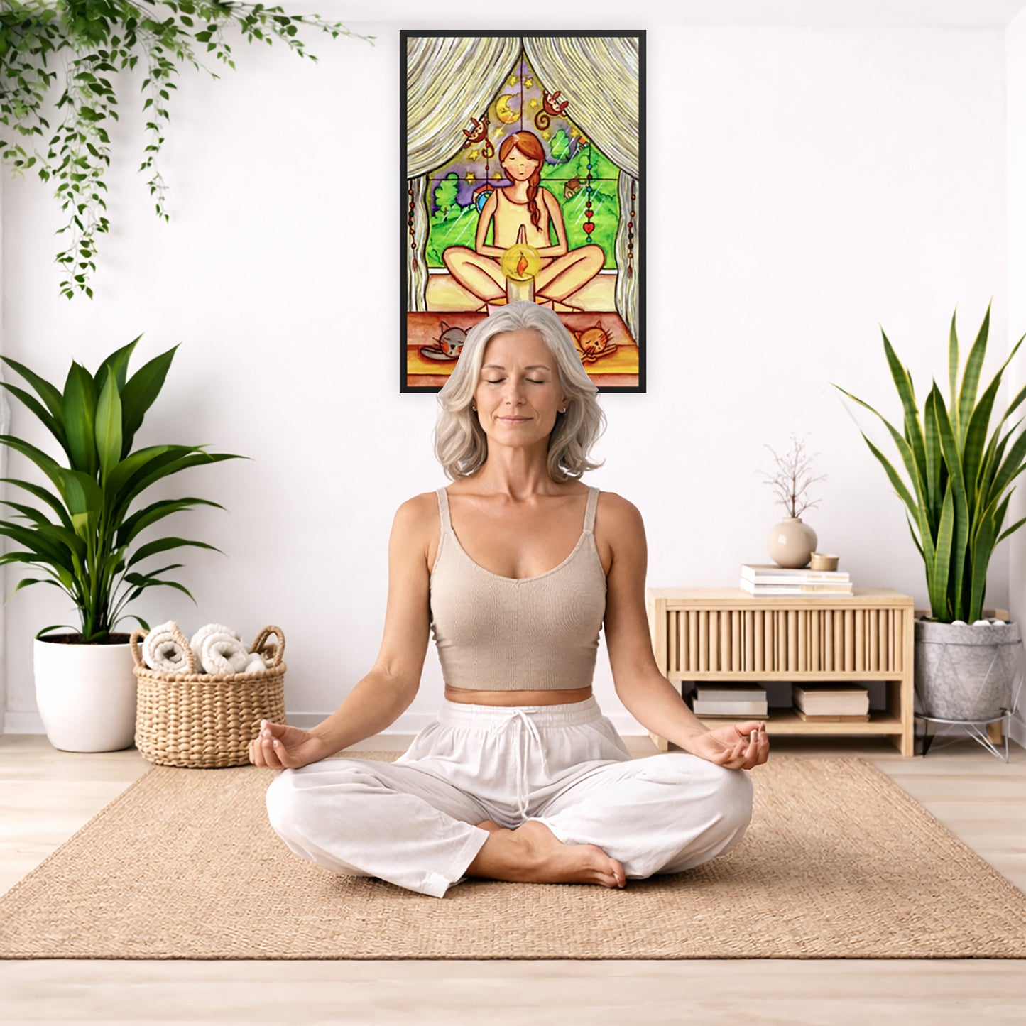 Woman mediating on candlelight framed poster. This is a print of the original hand-painted watercolor by Brazilian artist Thaís Suizo for the LET'S MEDITATE SERIES of mediation guides. The poster is framed hanging on a living room wall. A woman is mediating facing the poster. There is a coffee table in front of her with burning candles and a Buddha statue. There are green potted plants on each side of the room.
