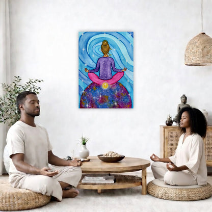 Canvas of a woman meditating with her root chakra glowing. This is a print of the original hand-painted watercolor by Brazilian artist Thaís Suizo for the LET'S MEDITATE SERIES of mediation guides.  The poster is in the center of the living room wall. Two friends are sitting on wicker pillows meditating. Between them is a small round coffee table with incense, a green potted plant and a bowl of shells. There is a potted plant to the left and a Buddha statue and a vase to the right. 