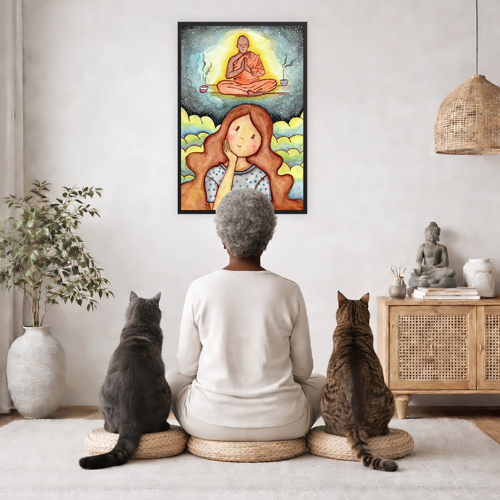 Framed print of a young woman wondering about taking up meditation as a Buddhist monk hovers above her on a higher level. The print is by Brazilian illustrator Thaís Suizo created for the LET'S MEDITATE series.  The poster is in the center of the living room wall. A woman is meditating facing the poster with a white cat on her left side and a black cat on her right side. There is a potted plant on the left side and a cabinet with a Buddha statue on it on the right side. 